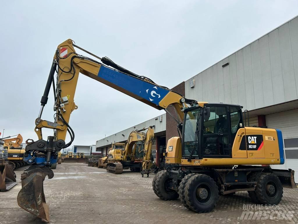 CAT M 318 F Mobilbagger