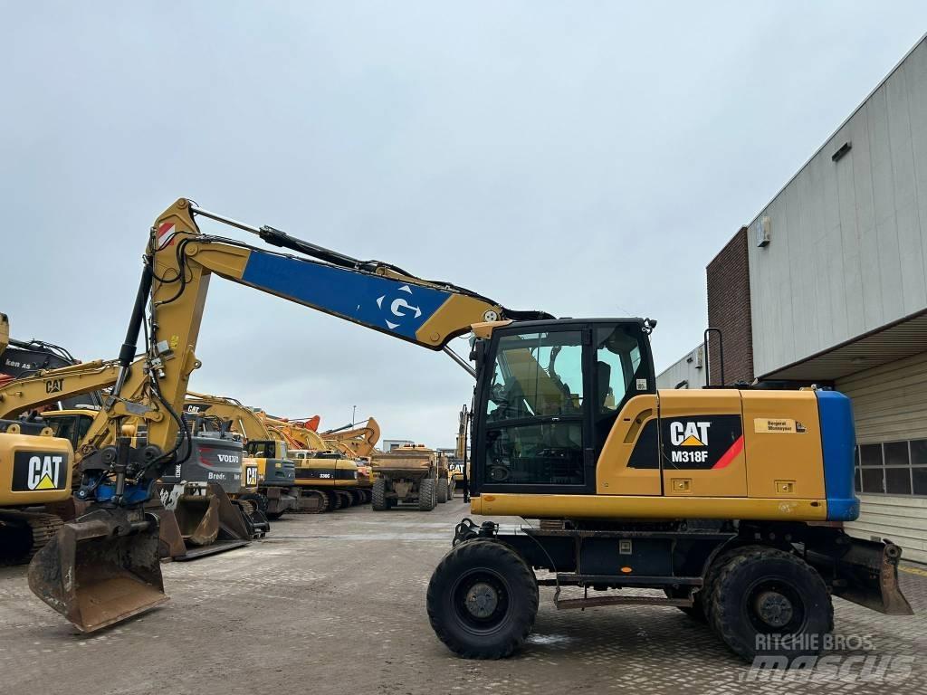 CAT M 318 F Mobilbagger