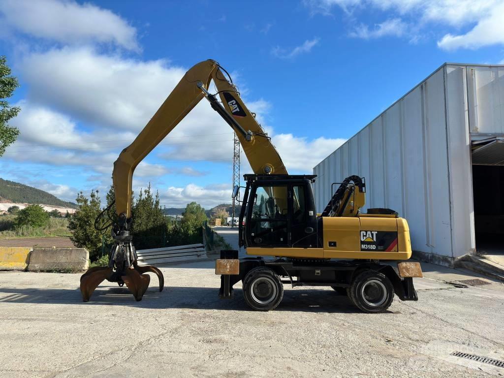 CAT M 318 MH Mobilbagger