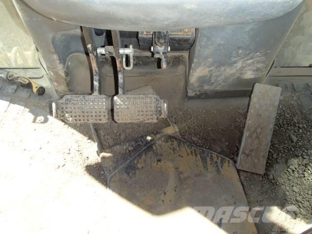 New Holland B 115 B Baggerlader