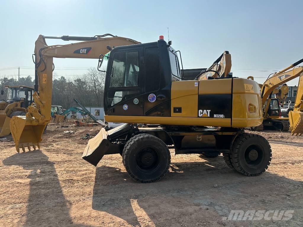 CAT M 320D Mobilbagger