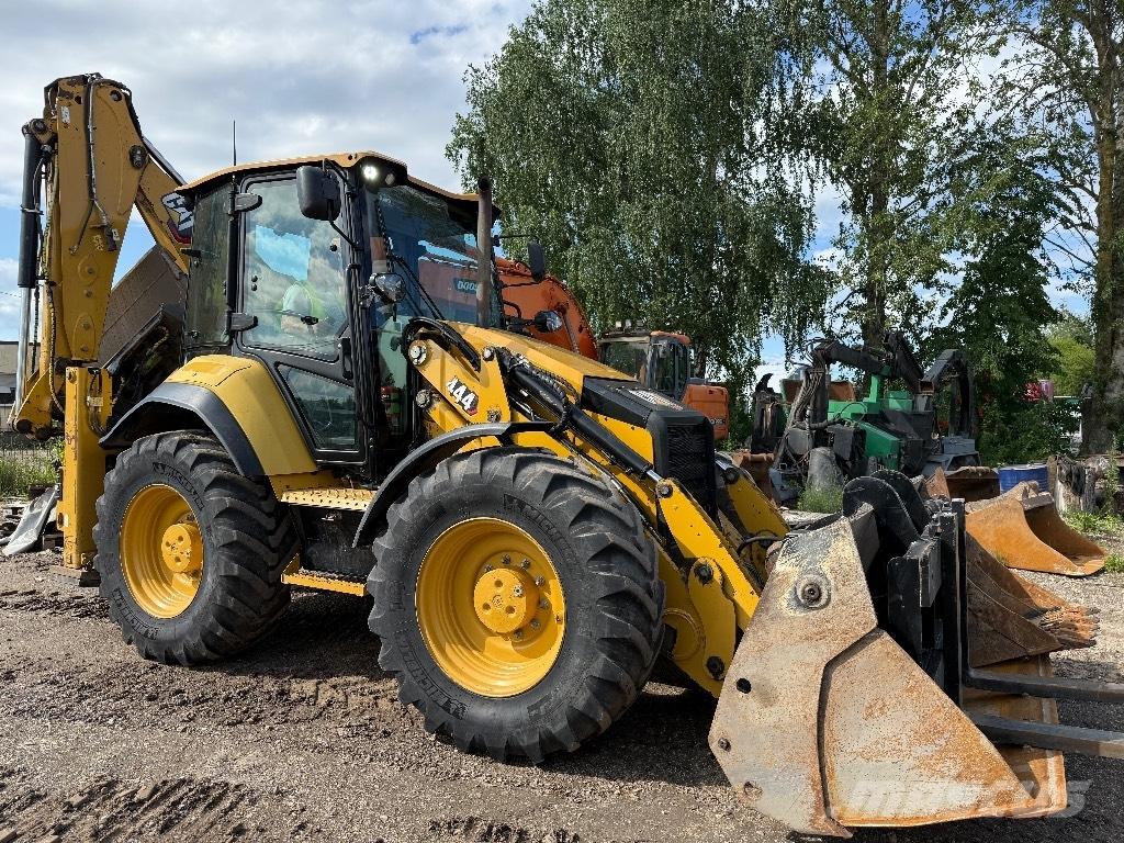 CAT 444 Baggerlader