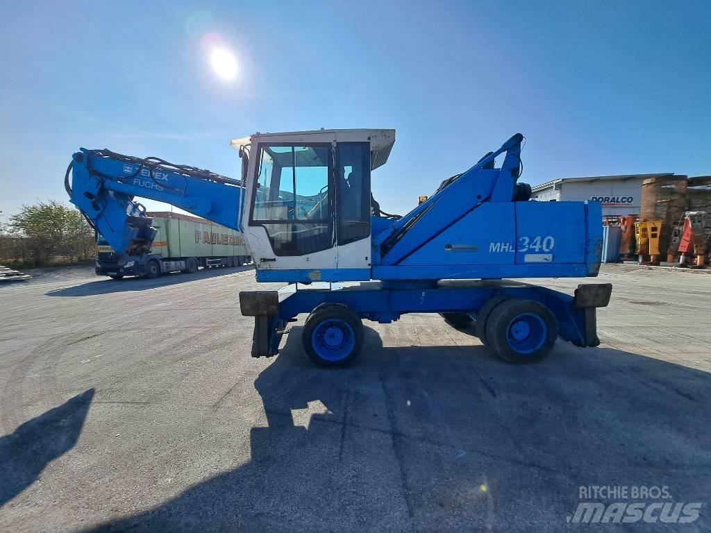 Fuchs MHL  340C FQC Materialumschlag