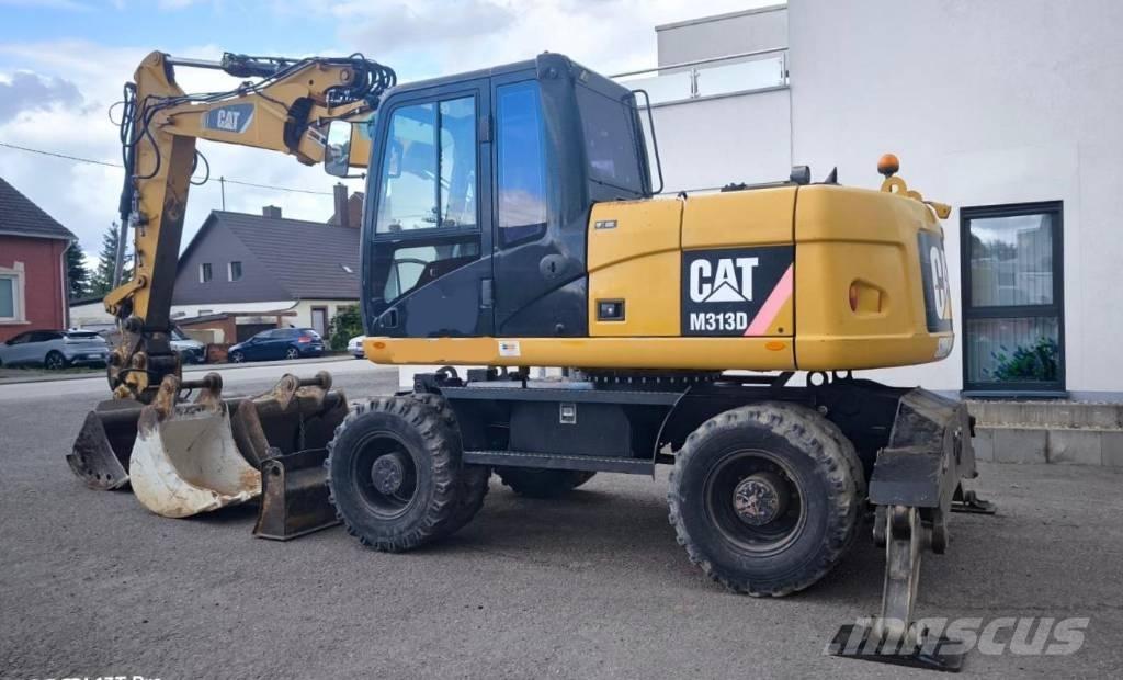 CAT M 313 D Mobilbagger