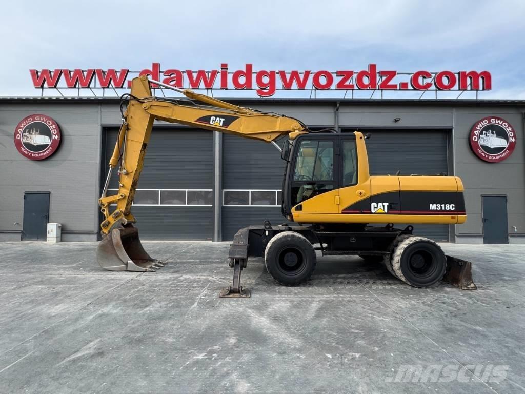 CAT M 318 C Mobilbagger