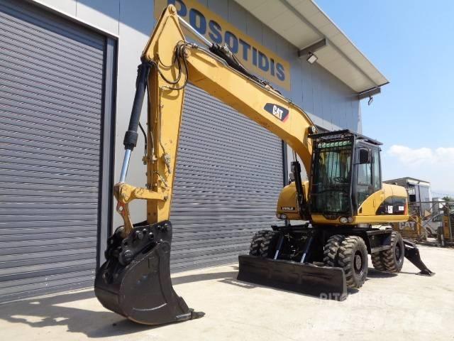 CAT M 318 D Mobilbagger