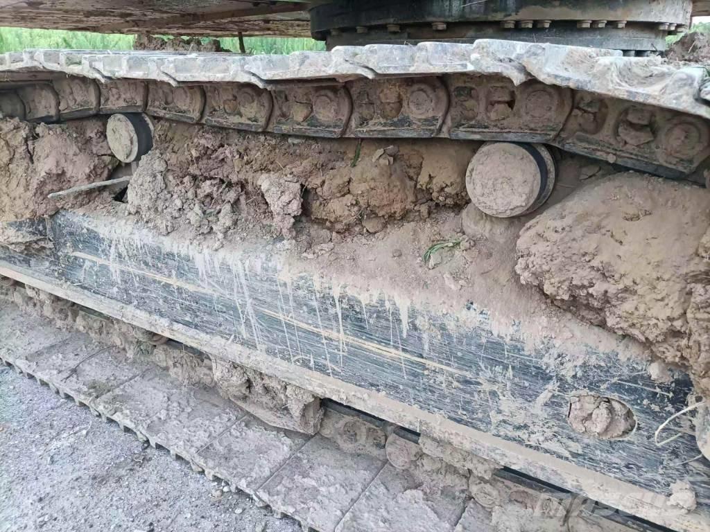 CAT 323GX Amphibienbagger