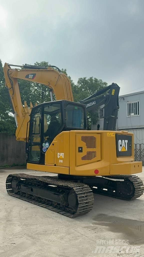 CAT 310 Walzenzüge