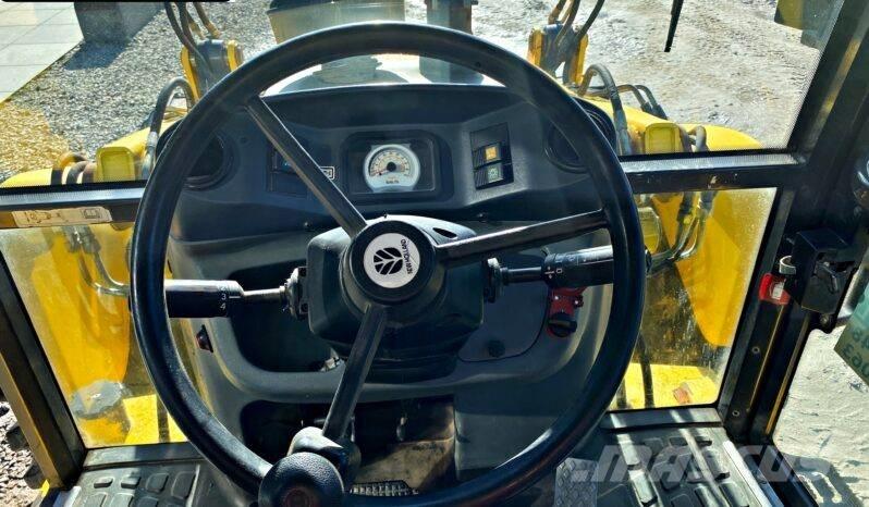 New Holland B 115 Baggerlader