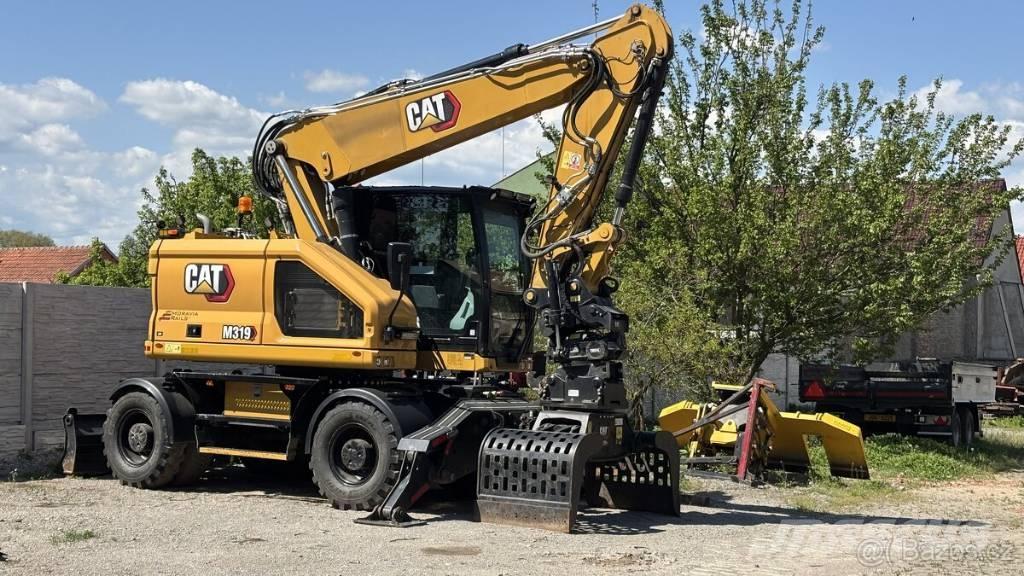 CAT M 319 Mobilbagger