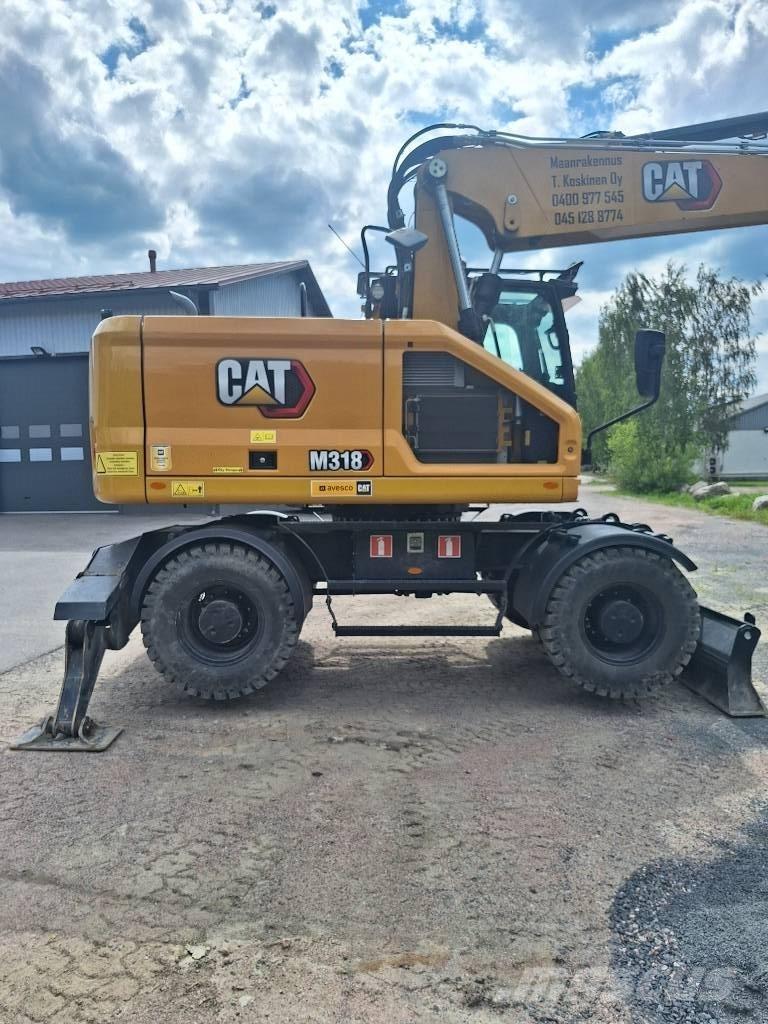 CAT M 318 Mobilbagger