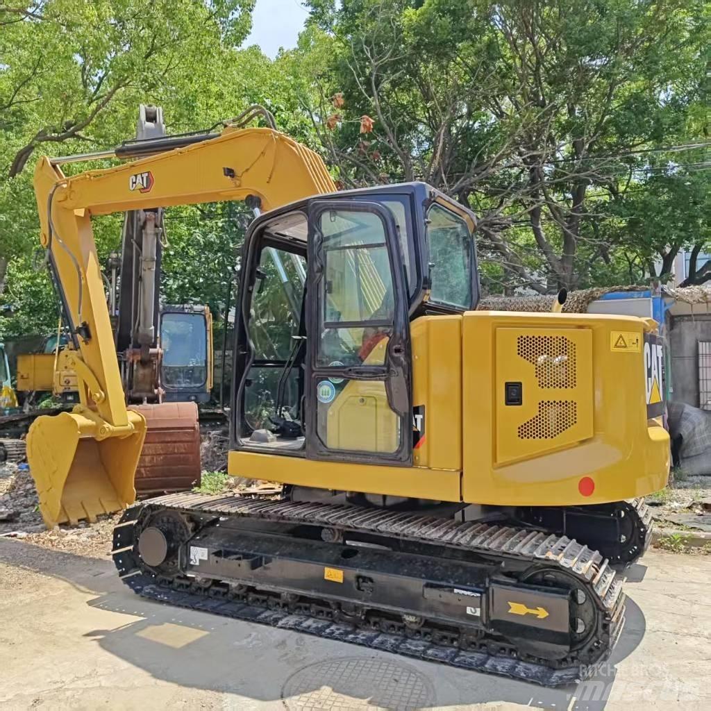 CAT 310 Raupenbagger