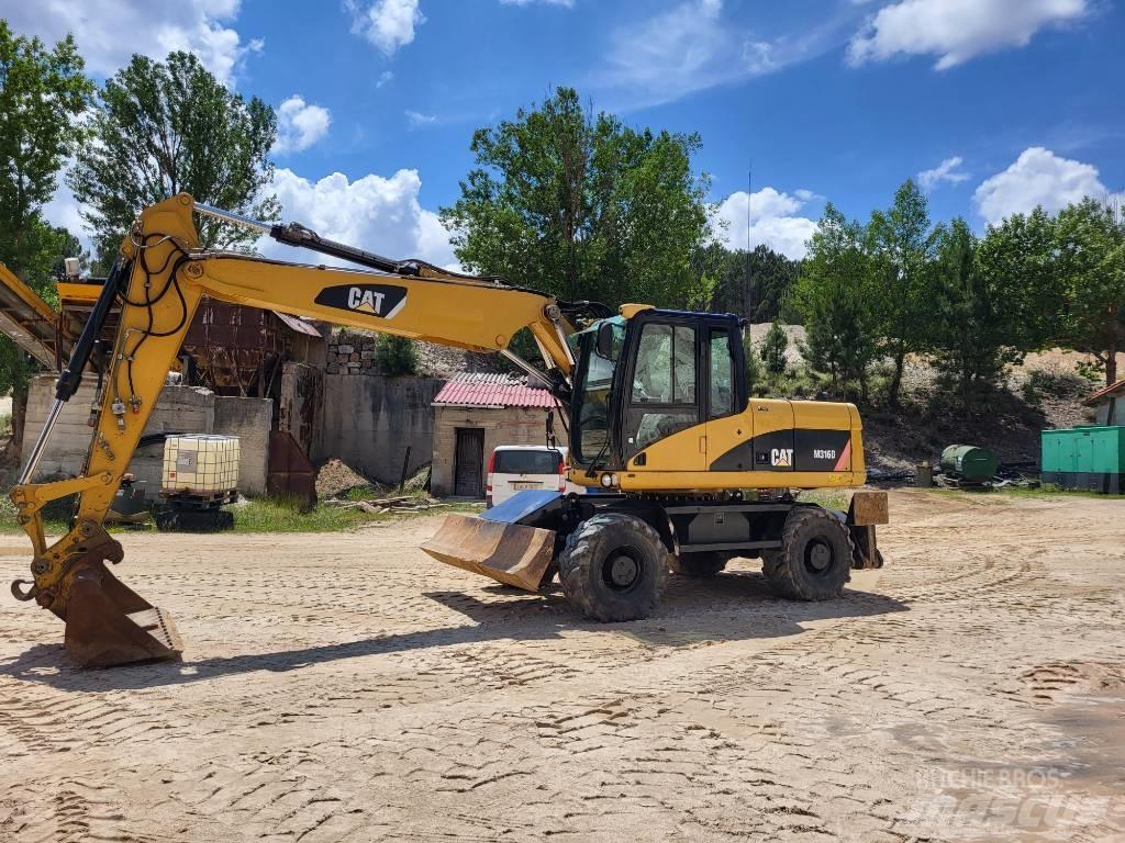 CAT 316d Mobilbagger