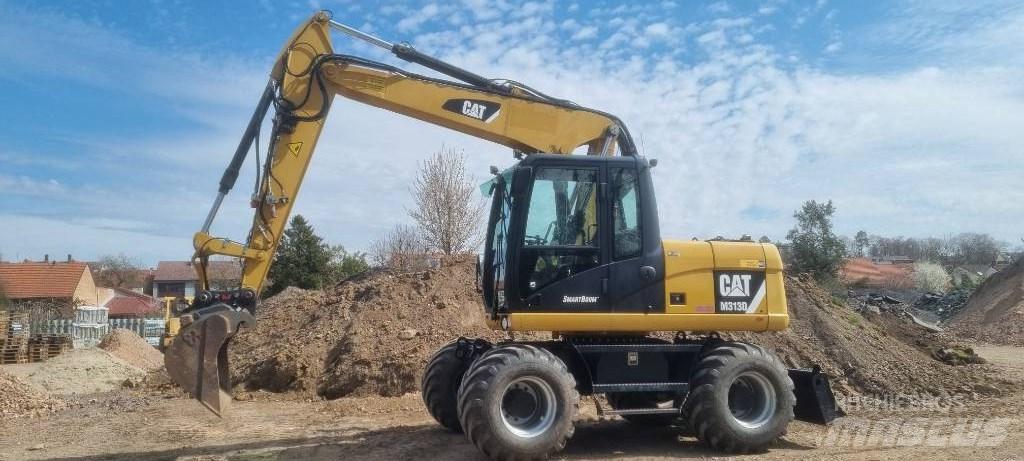 CAT M 313 D Mobilbagger