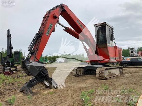 Madill 3800B Gelenkausleger Lader