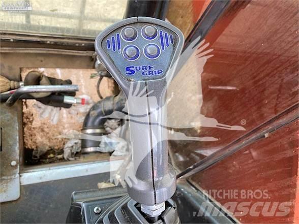 Madill 3800B Gelenkausleger Lader