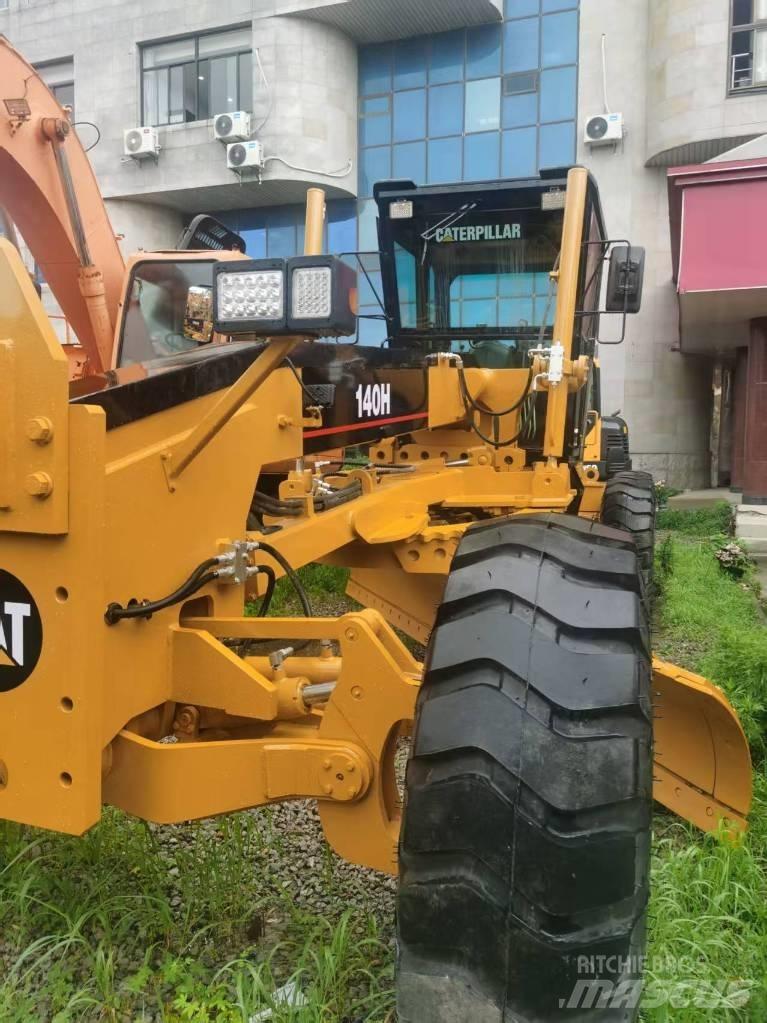 CAT 140 H Baggerlader
