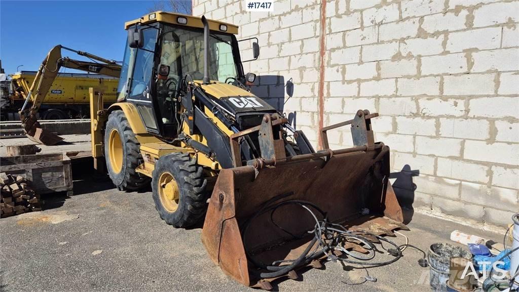 CAT 428D Baggerlader