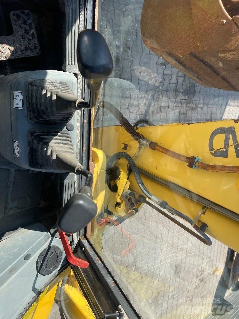 New Holland LB 110 Baggerlader