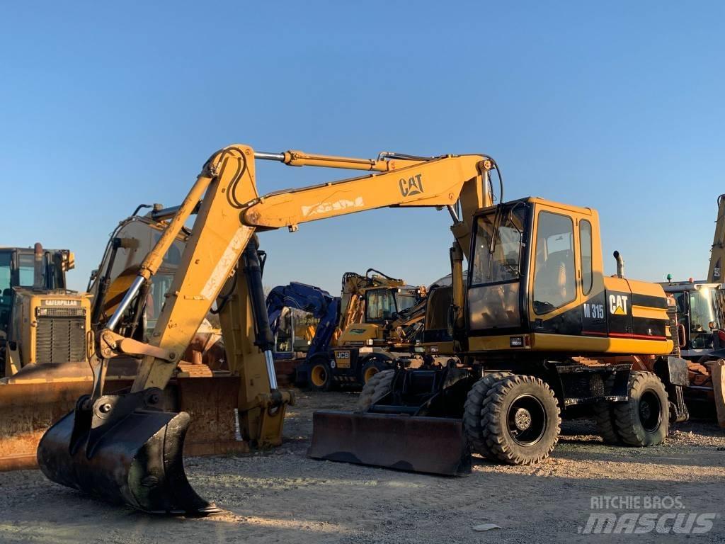 CAT M 315 Mobilbagger