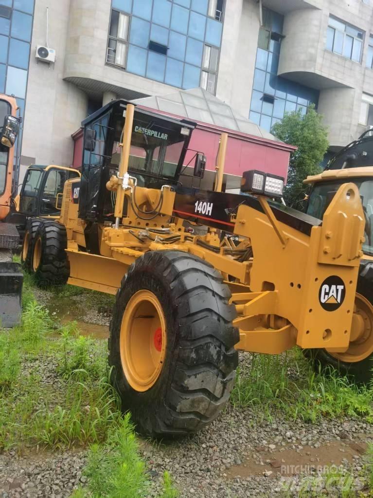CAT 140 H Baggerlader