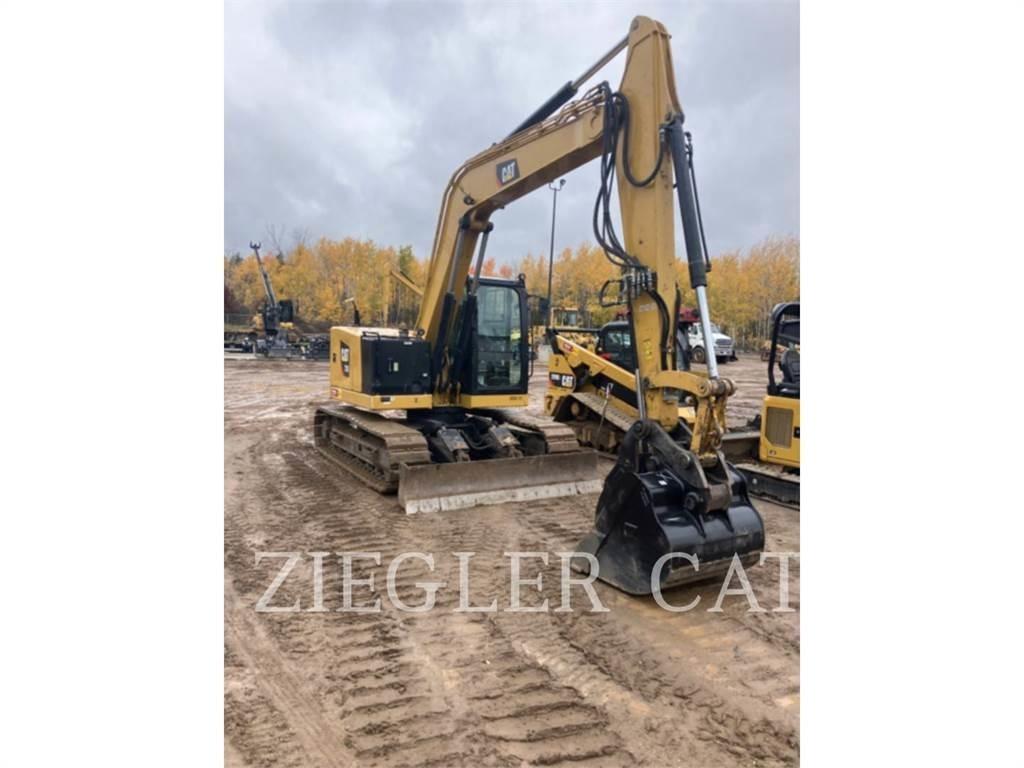 CAT 310 Raupenbagger