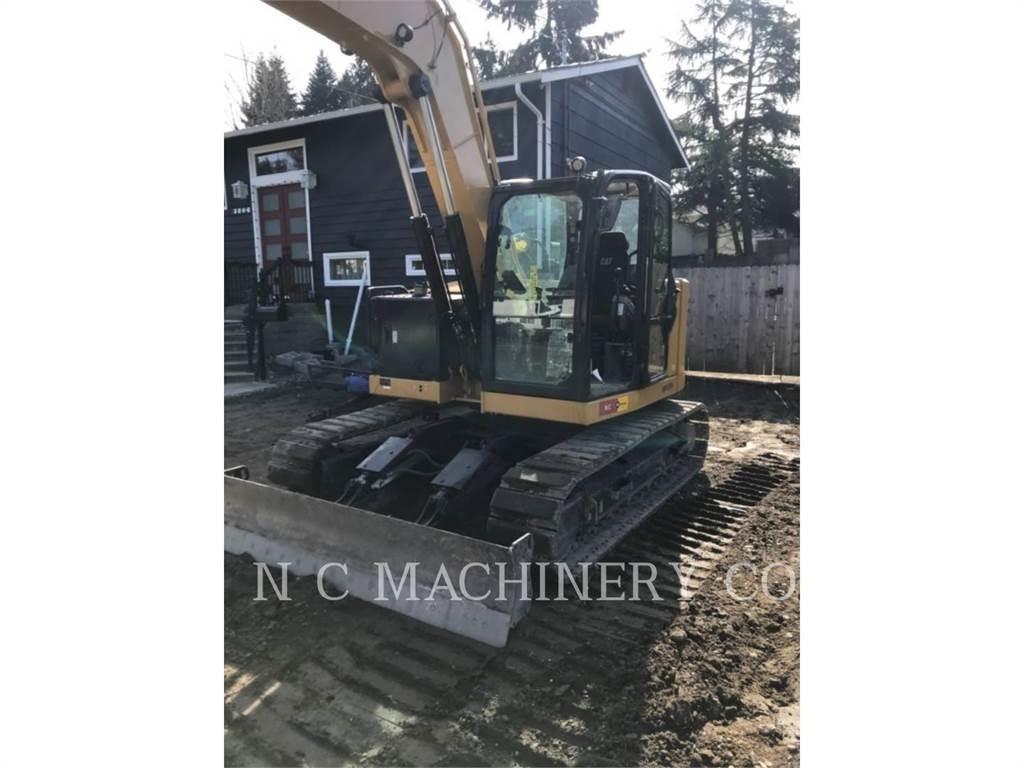 CAT 310 Raupenbagger