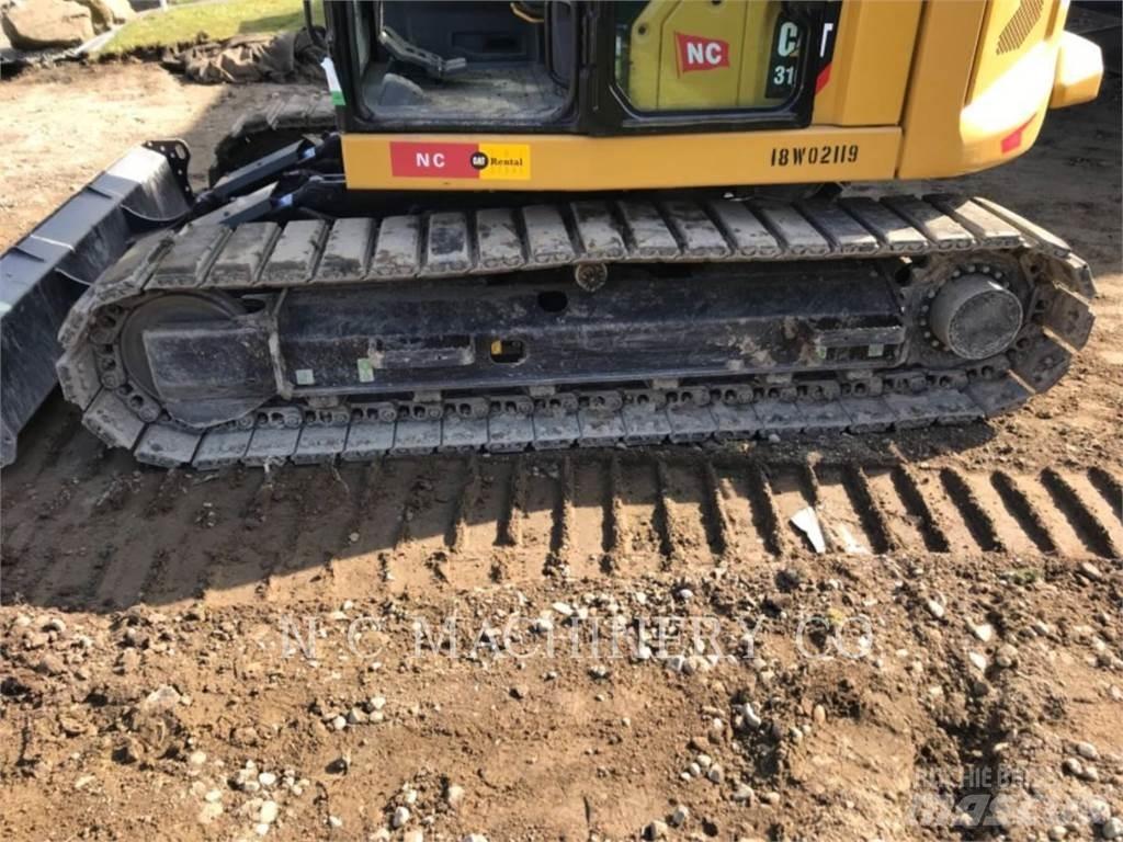 CAT 310 Raupenbagger
