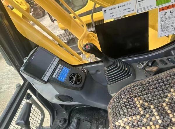 Komatsu PC 200 Midibagger  7t - 12t