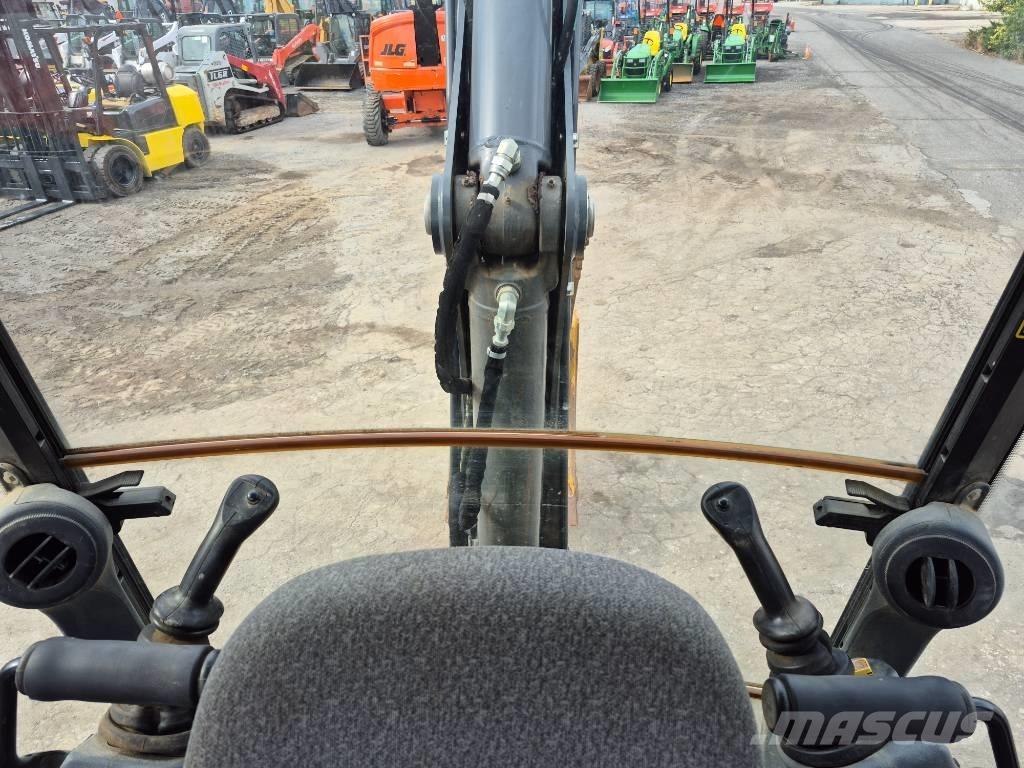 John Deere 310 Baggerlader