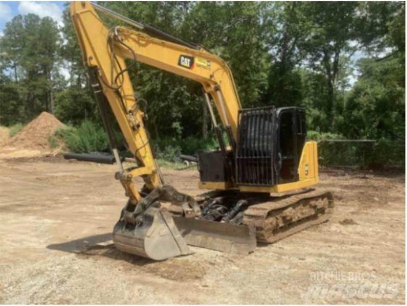 CAT 310 Raupenbagger
