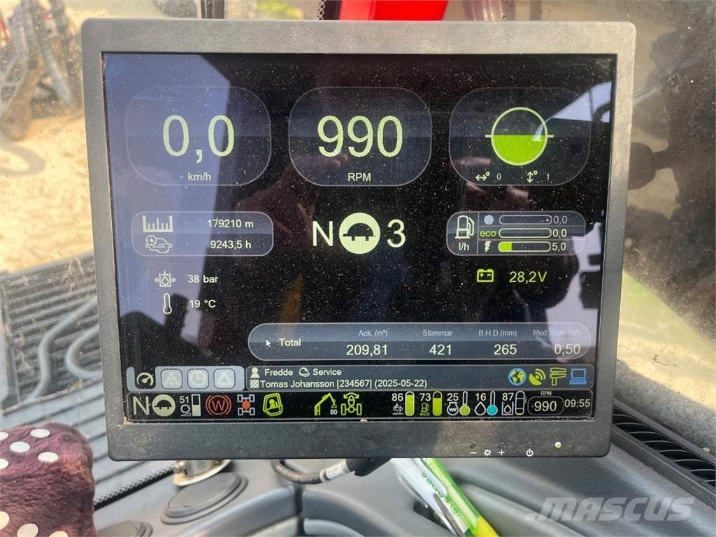 Komatsu 951 / C144 Harvester