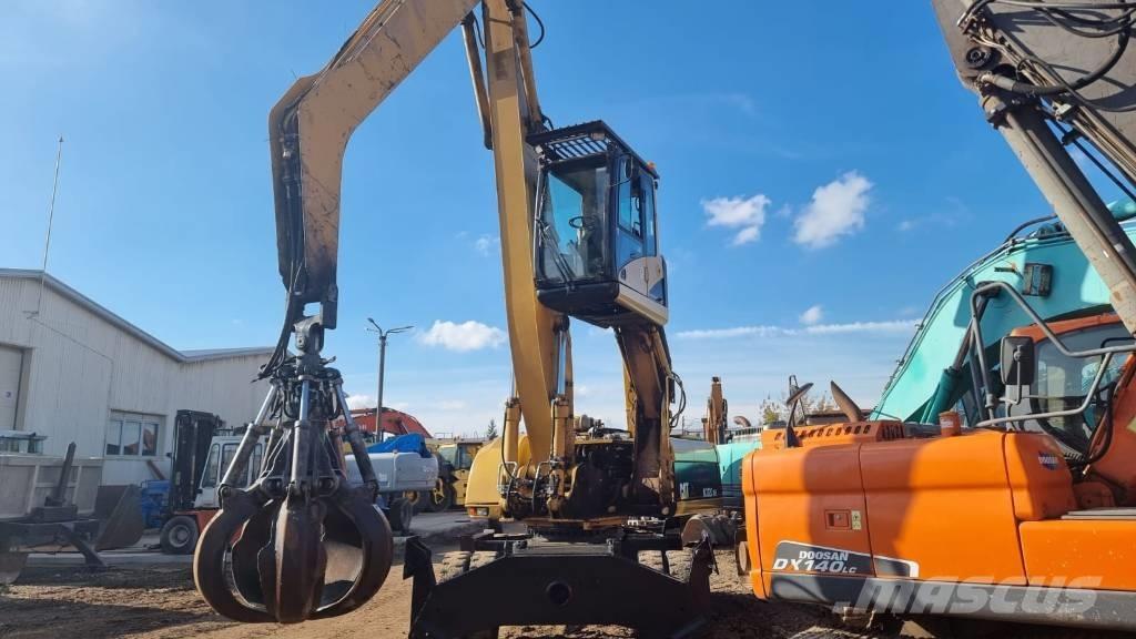 CAT M 322 C MH Materialumschlag