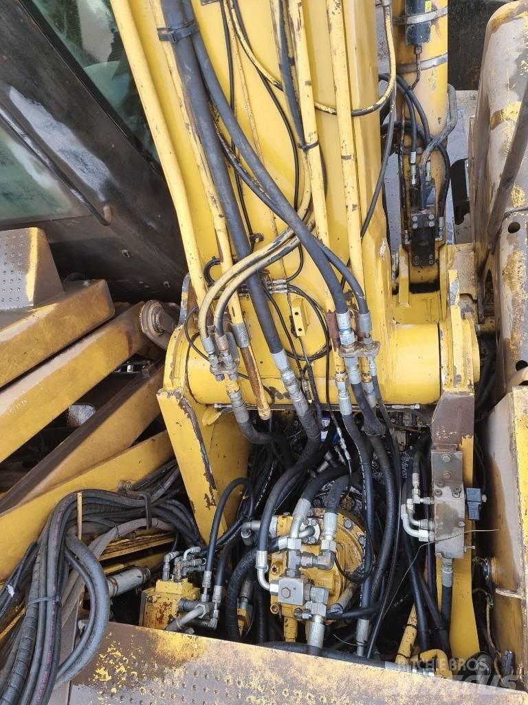 CAT M 325 D L MH Materialumschlag