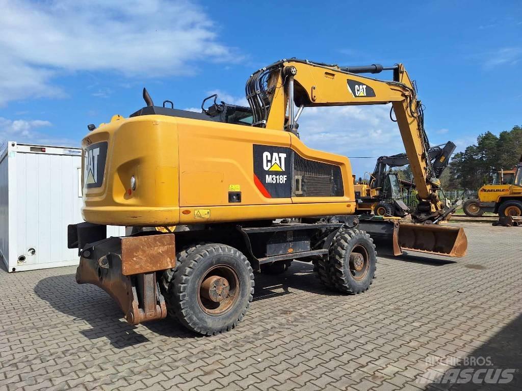 CAT M 318 F Mobilbagger