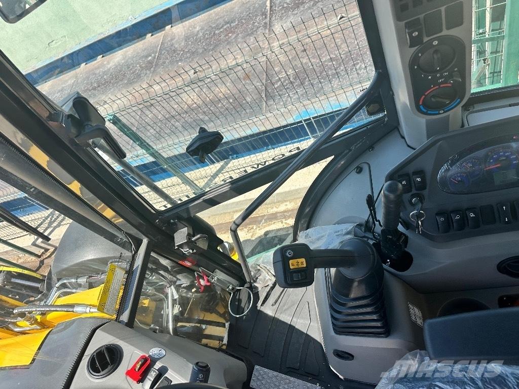 New Holland B 115 B Baggerlader