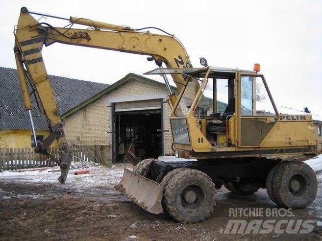 CAT 212 til ophug Raupenbagger