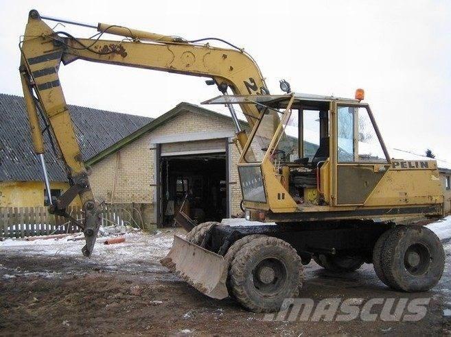 CAT 212 til ophug Raupenbagger