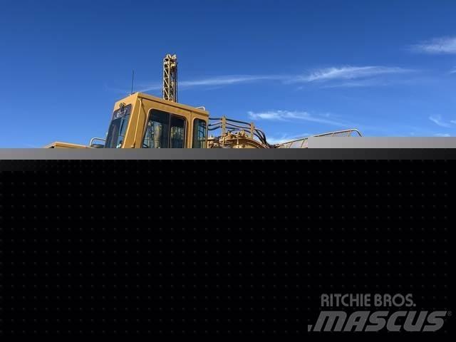 CAT 633E Schaber