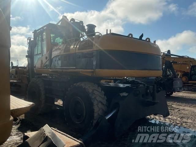 CAT M325CMH Gelenkausleger Lader