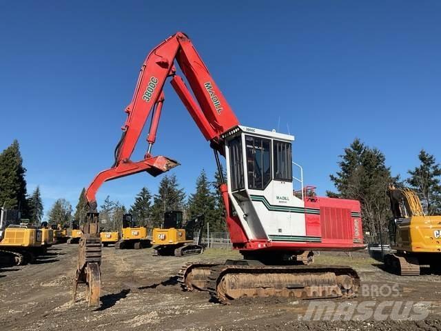 Madill 3800C Gelenkausleger Lader