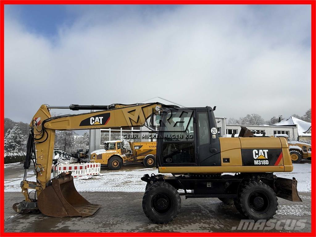 CAT M 318 D Mobilbagger