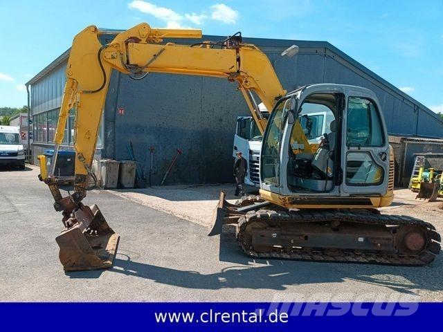 New Holland E70SR 4 Baggerlader