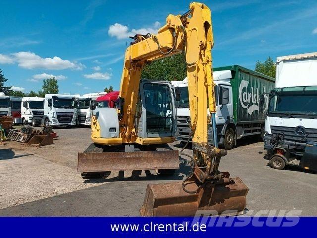 New Holland E70SR 4 Baggerlader