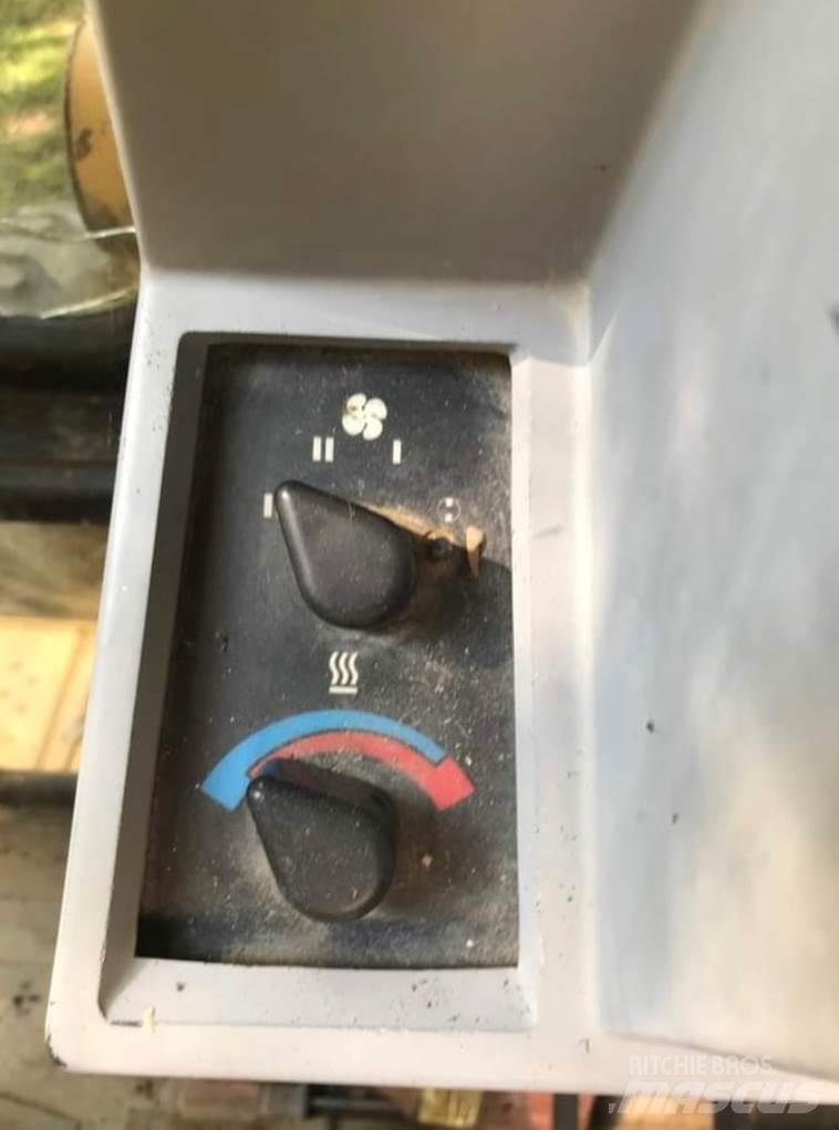 CAT 416B Baggerlader