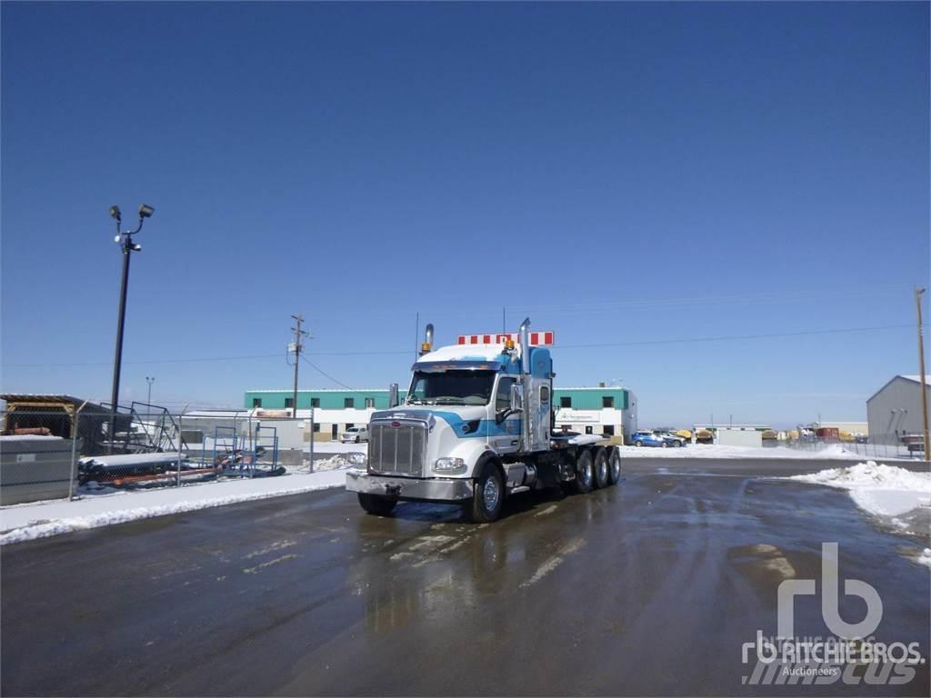 Peterbilt 567 Pritschenwagen mit Seilwinde